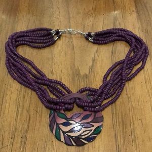 Marshall’s Eggplant Beaded Leaf Charm Necklace.